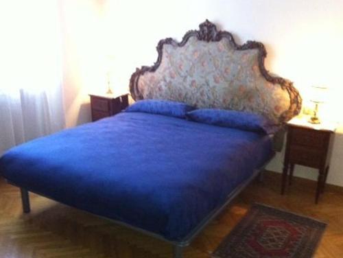 A bed or beds in a room at Villa Camilla