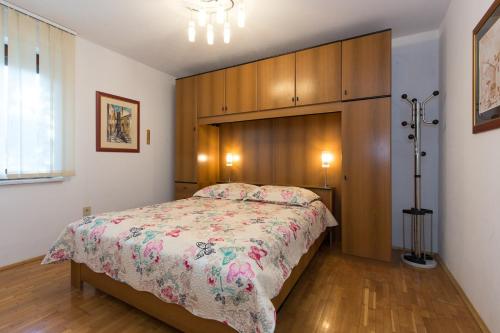 Cama ou camas em um quarto em GIOVANNI Krk