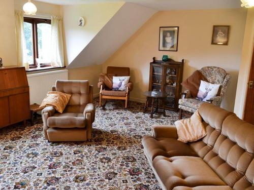 A seating area at Coachmans Cottage 