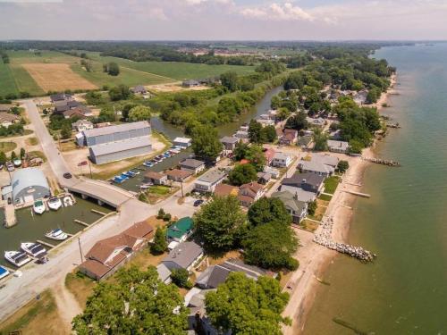 an aerial view of a small town next to the water at Cedar Island Xanadu in Kingsville