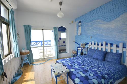 Postel nebo postele na pokoji v ubytování Sea House