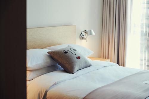 Cama o camas de una habitación en La Casa hotel Gwangmyeong
