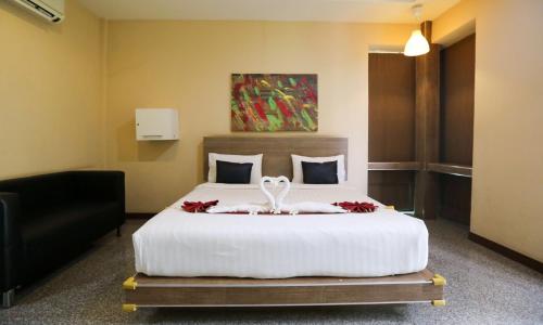 Postel nebo postele na pokoji v ubytování Jintana Resort