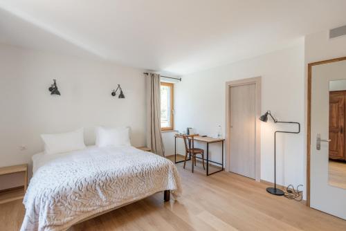 Cama o camas de una habitación en La Ferme du Lignon