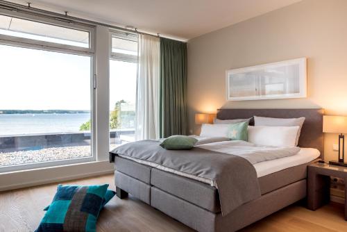 Postel nebo postele na pokoji v ubytování Intermar Hotel & Apartments