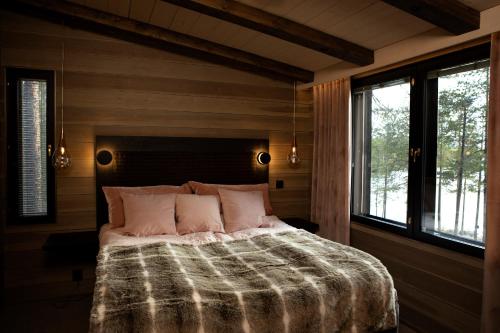 Postel nebo postele na pokoji v ubytování Willa Lumia