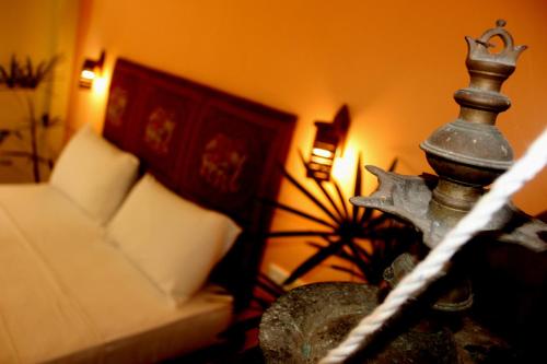 Postel nebo postele na pokoji v ubytování Onilwe Resort Weligama