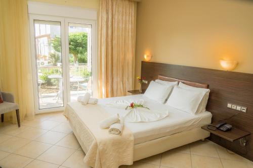 Posteľ alebo postele v izbe v ubytovaní Samothraki Village Hotel