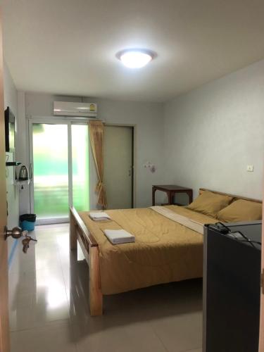 Ένα ή περισσότερα κρεβάτια σε δωμάτιο στο S Diamond Apartment