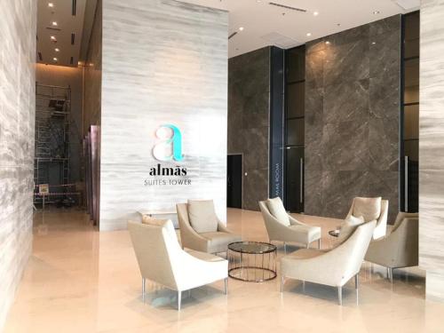 a lobby with chairs and a sign that reads alums skills centre at ALMAS PUTERI HARBOUR in Nusajaya