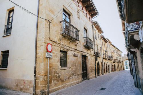 an empty street in an old building at Apartamentos Ducay in Olite