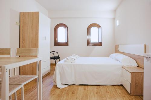 
Cama o camas de una habitación en Apartamentos Ducay
