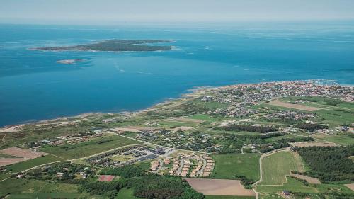an aerial view of a city and the ocean at Torekov Hotell in Torekov