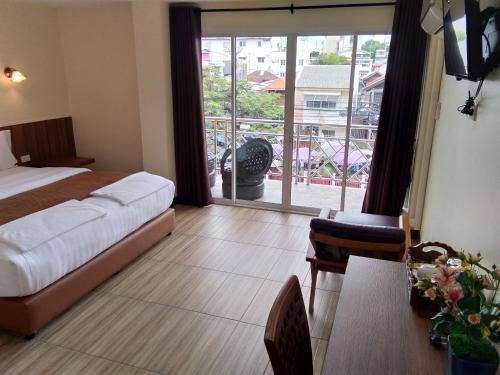 Letto o letti in una camera di Baan Wanchart
