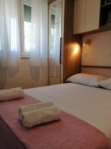 Postel nebo postele na pokoji v ubytování Holiday Home Perlica