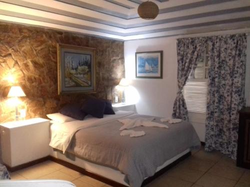 Postel nebo postele na pokoji v ubytování Pousada Búzios Summer Park