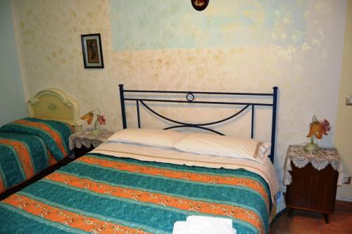 Postel nebo postele na pokoji v ubytování Appartamento bello e comodo