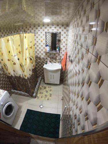 Et badeværelse på NNN Guest House
