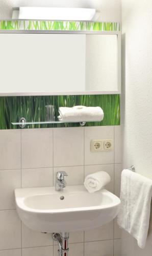 Bilik mandi di centra Hotel