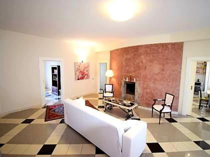 a living room with a couch and a table at Gess Etna Home in Giarre