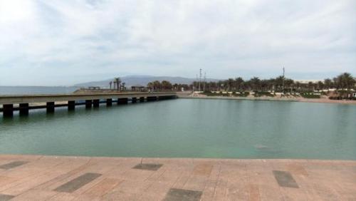 a large body of water with a pier in it at CABO GATA SUNNY HOUSE in Retamar