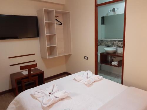 Katil atau katil-katil dalam bilik di Hotel La Posada de Francisca