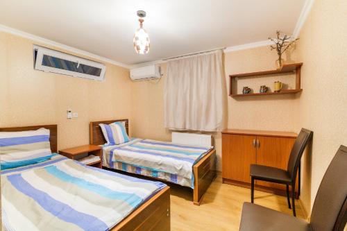 Llit o llits en una habitació de The Kiwi House