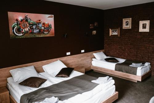Postel nebo postele na pokoji v ubytování Clubhouse