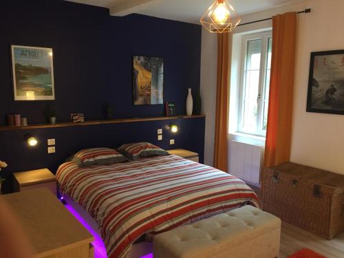 Ένα ή περισσότερα κρεβάτια σε δωμάτιο στο L appartement du parc