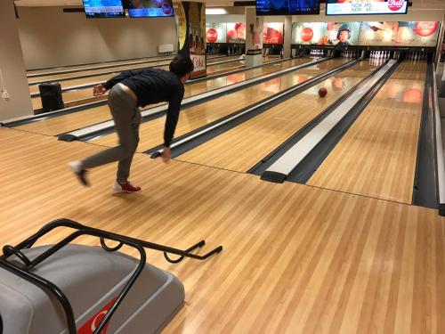 a woman playing bowling in a bowling alley at Lillebjørn in Trysil