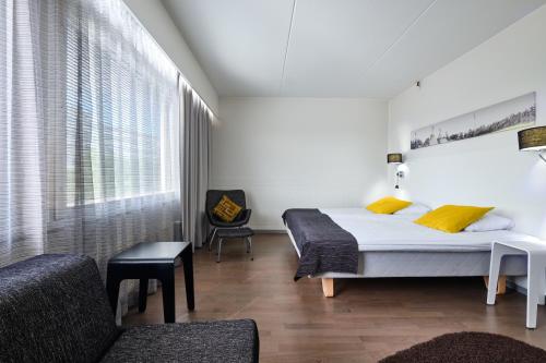 Postel nebo postele na pokoji v ubytování GreenStar Hotel Lahti