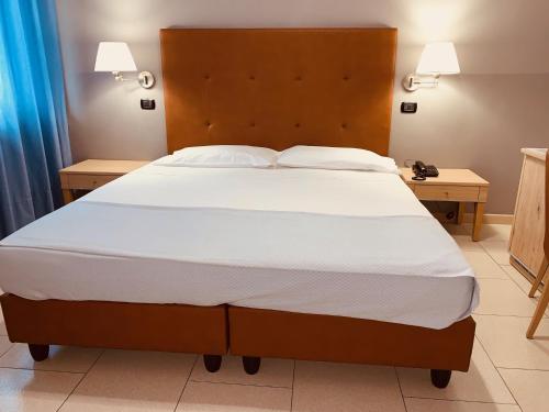 Postel nebo postele na pokoji v ubytování Flying Hotel