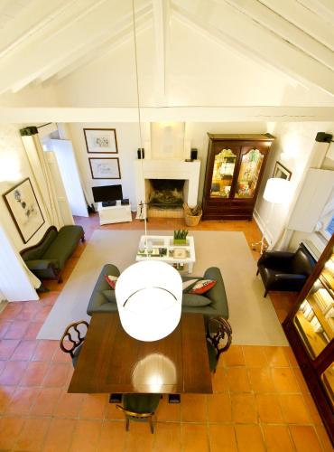 an overhead view of a living room with a table at Quinta Da Cabrita in Santarém