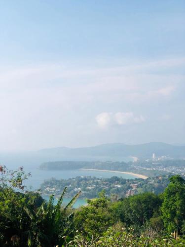 a view of a body of water from a hill at OK Phuket in Kata Beach