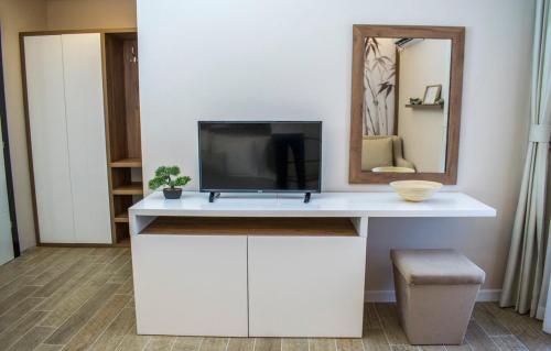 Un televizor și/sau centru de divertisment la Apartments Stanaj