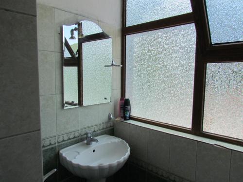 Koupelna v ubytování Hotel Germenji