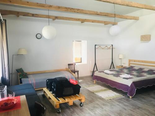 Postel nebo postele na pokoji v ubytování Sno House in Kazbeg