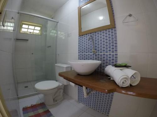 Ett badrum på Pitanga Ilha Grande