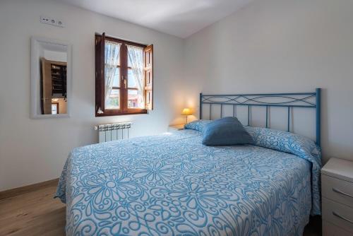 Llit o llits en una habitació de Casa vacacional Santander