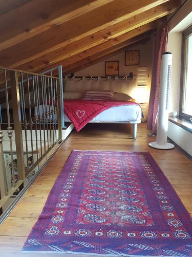 Postel nebo postele na pokoji v ubytování Au Coeur du Bourg CIR VDA LT AOSTA 0348