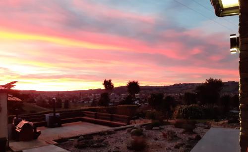 a view of a sunset from the roof of a house at The Reservation B&B in Gore
