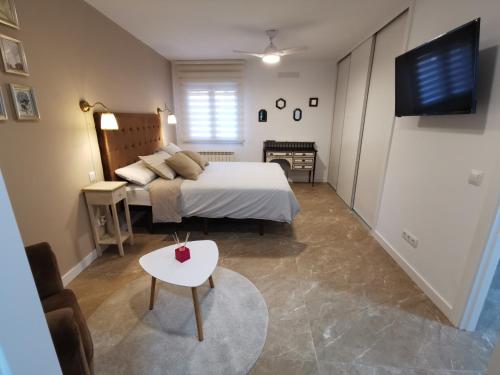 Кровать или кровати в номере Apartamento 4Bedrooms
