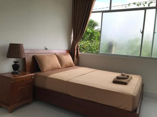 Ένα ή περισσότερα κρεβάτια σε δωμάτιο στο Phuc Sinh Homestay