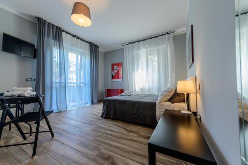 Ένα ή περισσότερα κρεβάτια σε δωμάτιο στο PATTY'S GUESTHOUSE