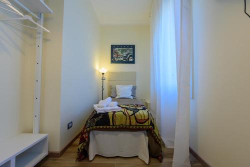 Ένα ή περισσότερα κρεβάτια σε δωμάτιο στο PATTY'S GUESTHOUSE