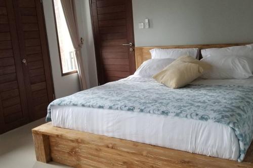 מיטה או מיטות בחדר ב-HOKYY Accommodation