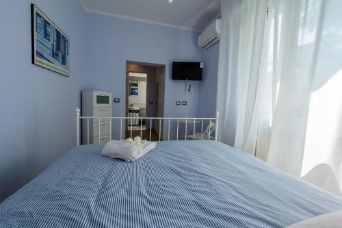 Ένα ή περισσότερα κρεβάτια σε δωμάτιο στο PATTY'S GUESTHOUSE