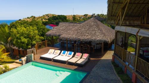 an aerial view of a resort with a swimming pool at JJ ET EUPHRASIE Lodge in Nosy Be