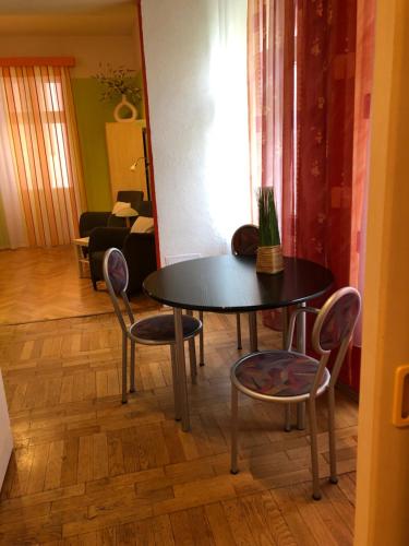 Coin salon dans l'établissement Apartmán Orchidej u Vřídla