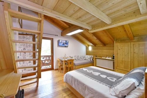 Un pat sau paturi într-o cameră la La Casa Della Guida